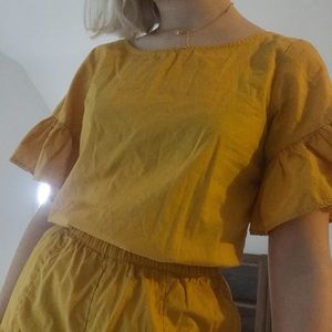 CLEARANCE yellow ruffled american eagle romper